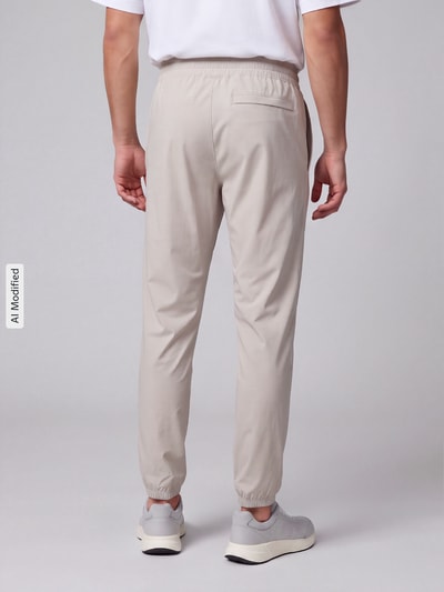 Under Armour Relaxed Fit Trainingshose mit Label-Print Khaki 5