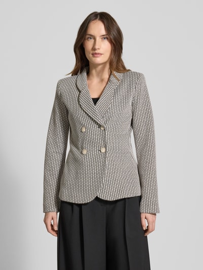 Frauenmodel trägt Slim Fit Blazer mit Reverskragen von Emporio Armani, doppelte Knopfleiste, gemustertes Design, Ganzkörperansicht von vorne.