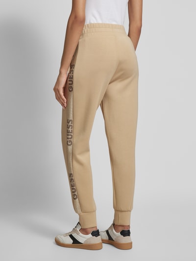 Guess Slim fit sweatpants met labelprints Taupe - 5