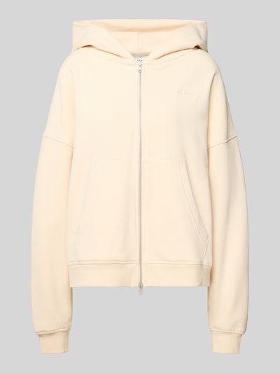 Produktfoto, Oversized Sweatjacke mit Zweiwege-Reißverschluss Modell 'Flower' von OH APRIL aus Reine Baumwolle mit Kapuze, Label-Stitching und Känguru-Tasche, cremefarben, glatte Textur.