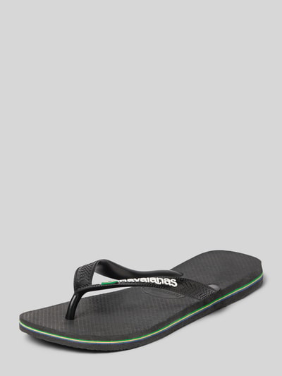 Produktfoto, Slippers mit Logo-Detail Modell 'Brasil' von Havaianas, schwarze Farbe, abgerundete Passform, offene Ferse, 2 cm Absatzhöhe, 8 cm Schaftweite, feine Struktur, minimalistisches Design