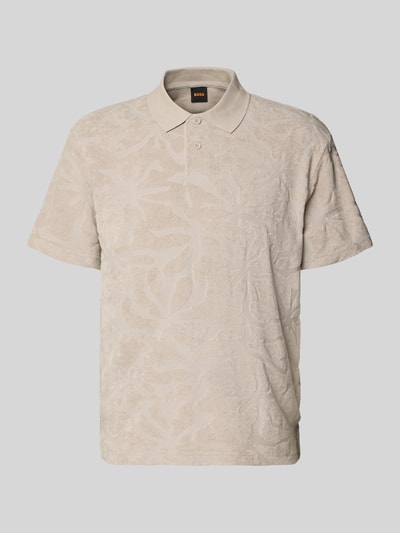 Produktfoto, Regular Fit Poloshirt aus Baumwoll-Mix Modell 'PE_FLOWER' von BOSS Orange mit Allover-Muster, Struktur, in Beige, kurze Ärmel, Frottee-Textur, Polokragen, V-Ausschnitt mit 2-Knopf-Verschluss, Label-Applikation, Seitenschlitze