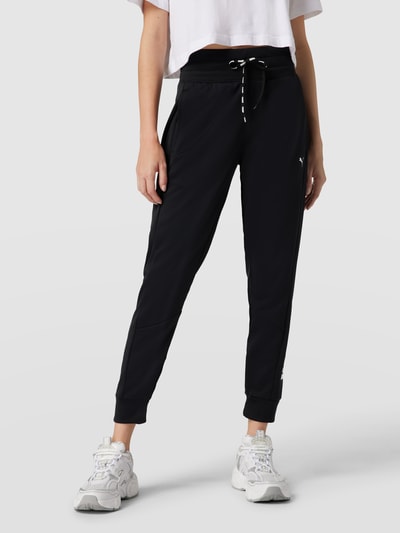 PUMA PERFORMANCE Trackpants mit Label-Print Modell 'Tech' Black 4