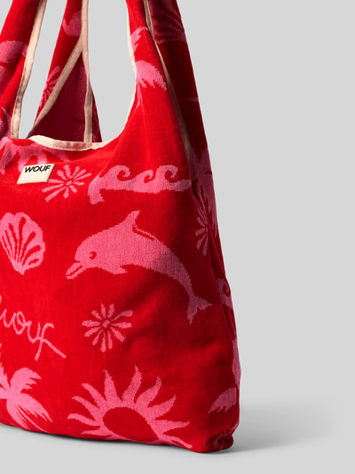 Produktfoto, Umhängetasche mit Label-Patch Modell 'Tulum' von WOUF aus Reine Bio-Baumwolle in Rot mit rosa Motiv, offenes Hauptfach, Tragehenkel, Breite 38 cm, Länge 38 cm, Tiefe 2 cm, Länge Schulterriemen 65 cm