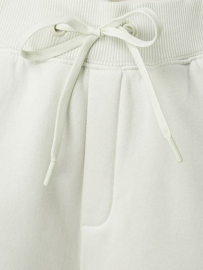 Guess Spodnie dresowe z mieszanki bawełny z dodatkiem materiału ekologicznego Miętowy 4