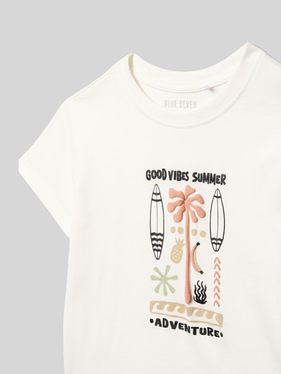 Produktfoto, Kinder T-Shirt mit Motiv-Print von Blue Seven in Offwhite, Reine Baumwolle, Regular-Fit, Rundhalsausschnitt, Rückenlänge 39 cm bei Größe 116, grafische Details in sanften Farben
