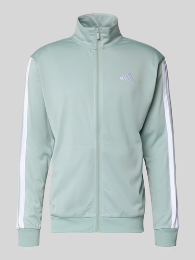 Productfoto, trainingsjack met logo van adidas Sportswear in lichtgroen met witte accenten, regular fit, opstaande kraag, ritssluiting, ruglengte maat M 71 cm, mouwlengte maat M 65 cm.