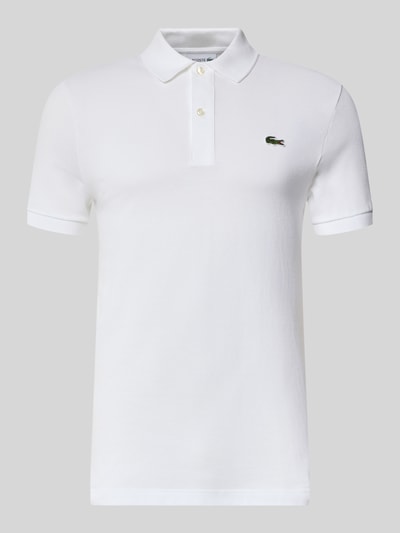 Produktfoto, biała koszulka polo krój slim fit z czystej bawełny Slim Fit Poloshirt aus reiner Baumwolle von Lacoste, gładka faktura