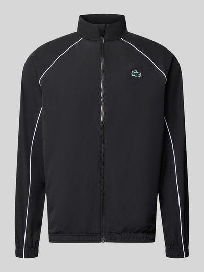 Produktfoto, schwarze Regular Fit Trainingsjacke mit Logo-Patch von Lacoste, weiße Paspeln, glatte Textur, Herren Trainingsjacke von Lacoste Sport