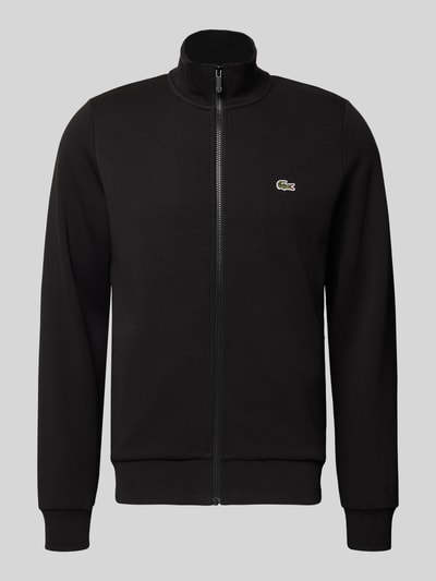 Produktfoto, Regular Fit Sweatjacke aus Baumwoll-Mix von Lacoste in Schwarz mit Stehkragen, Reißverschluss, seitlichen Taschen und Label Patch.
