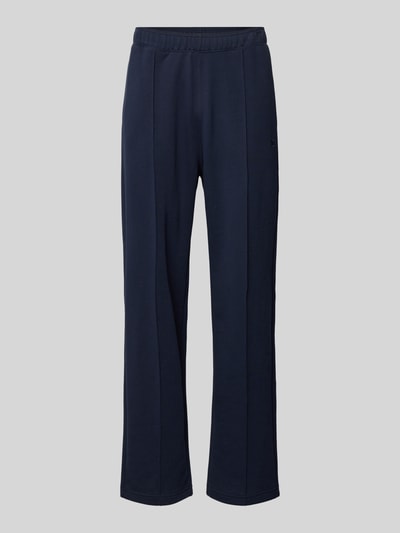 Produktfoto, Sweatpants mit Längsnähten und Label-Stitching von CHAMPION, kolor granatowy, mieszanka bawełny, krój relaxed fit, elastyczny pas, długość wewnętrzna nogawki w rozmiarze M: 81 cm, widoczne strukturalne szwy i haftowane logo