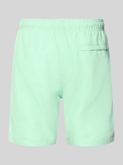 Produktfoto, mintgrüne Herren Badehose mit Label-Patch Modell 'Mike' von Shiwi, Loose-Fit, elastischer Bund, Gesäßleistentasche