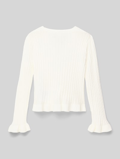 Mädchen trägt Strickjacke mit Knopfleiste von Guess in Weiß, Material-Mix mit Stretch-Anteil, Regular Fit, gerippte Abschlüsse, Rückenlänge 50 cm, Ärmellänge 38 cm, Ganzkörperansicht Rückansicht.