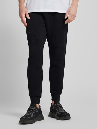 Under Armour Regular fit sweatpants met ritszak, model 'UNSTOPPABLE' Zwart - 4