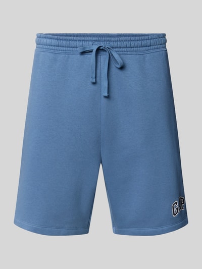 Produktfoto, Sweatshorts mit Logo und elastischem Bund von GAP aus Baumwoll-Mix, Regular-Fit, blauer Farbton, sichtbare Eingrifftaschen, Logo am Bein, Bundweite 40 cm, Innenbeinlänge 21 cm, glatte Textur