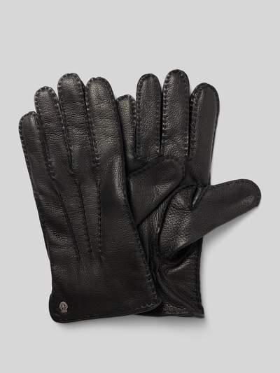 Produktfoto, schwarze Lederhandschuhe aus echtem Leder Modell 'Garmisch' von Roeckl, Ziernähte, Label-Detail metallic, strukturierte Oberfläche