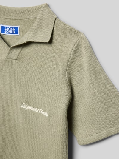 Productfoto, Regular Fit poloshirt met logo-stitching model 'Rebro' van Jack & Jones voor kinderen van puur katoen, polokraag, korte mouwen, ruglengte maat 140: 51 cm, lichtgroene kleur, structuur met fijne textuur.