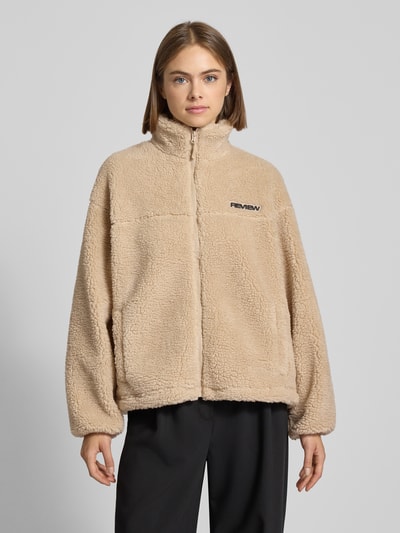 Review Kurtka polarowa ze stójką i detalem z logo Écru 4