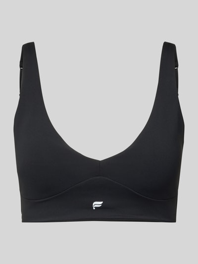 Produktfoto, czarny stanik z mieszanki elastycznych materiałów z nadrukiem z logo, krój dopasowany, model 'PURELUXE LONGLINE' od Fabletics, zapięcie na haftkę z tyłu, typ Low Impact Bra