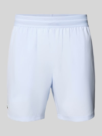Produktfoto, Loose Fit Sport-Shorts mit Mesh-Bund od Lacoste, jednokolorowy efekt, wyhaftowane logo, elastyczny siateczkowy pas, wpuszczane kieszenie
