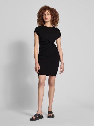 EDITED Knielange jerseyjurk met knoopdetail, model 'Faith' Zwart - 1