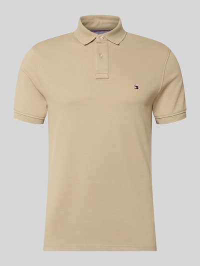 Produktfoto, Regular Fit Poloshirt aus Baumwoll-Mix von Tommy Hilfiger, efekt: jednolity kolor, krój regular fit, wyhaftowane logo, kołnierzyk polo, zapięcie na 2 guziki, krótkie rękawy, wykończenie z rozcięciem, wykończenie materiału: pika, z mieszanki bawełny