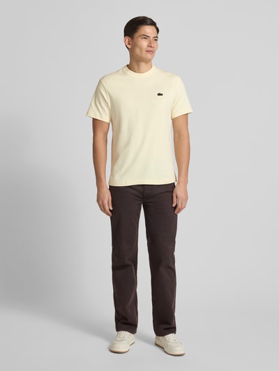 Lacoste T-shirt o kroju regular fit z czystej bawełny model „LOURD” Écru 1