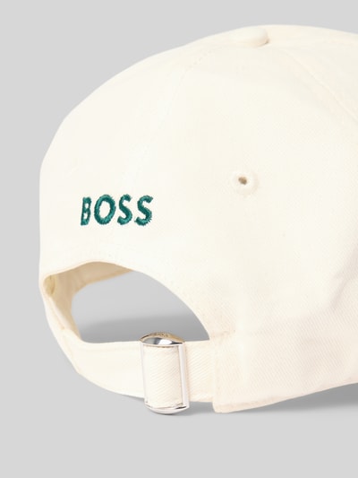 Produktfoto, Basecap aus reiner Baumwolle Modell 'LILYAN' von BOSS Orange in Unifarbe mit grünem Label Stitching, verstellbarem Riegel, strukturierte Webware