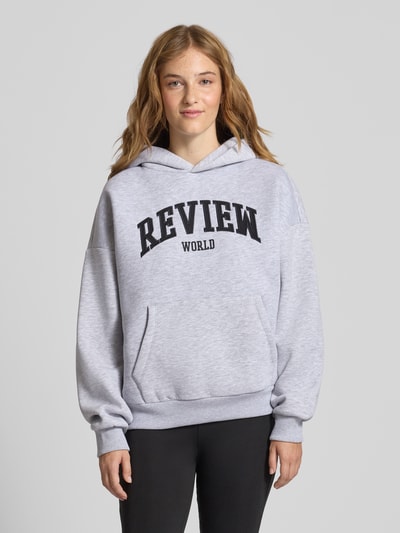 Review Bluza z kapturem o kroju oversized z nadrukiem z logo Jasnoszary melanż 4