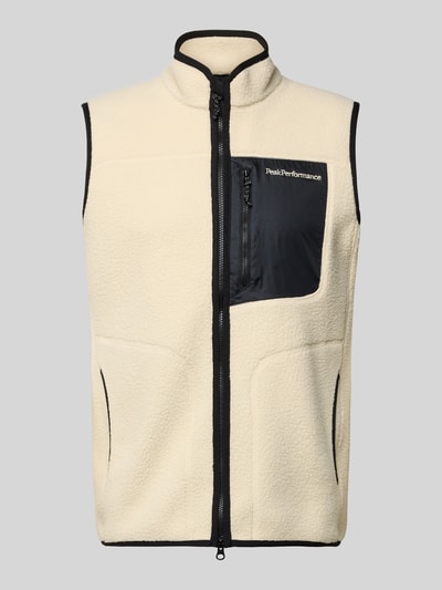Produktfoto, Weste mit Brusttasche Modell 'NatureRush' von PEAK PERFORMANCE aus Fleece in Beige mit schwarzem Zweiwege-Reißverschluss, gerader Schnitt, Logo-Stitching und Brusttasche mit Reißverschluss, strukturierte Oberfläche.