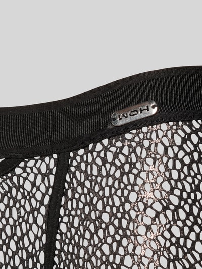 Produktfoto, Trunks mit Label-Detail Modell 'Night Universe' von WOH, semitransparent, schwarzer Netzstoff, elastischer Bund, Material-Mix mit Stretch-Anteil