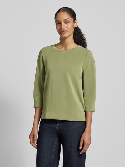 Frauenmodel trägt Comfort Fit Sweatshirt aus Modal-Mix von s.Oliver RED LABEL, Optik: Unifarben, Rundhals, 3/4-Arm, Scuba-Material, Ganzkörperansicht von vorne.