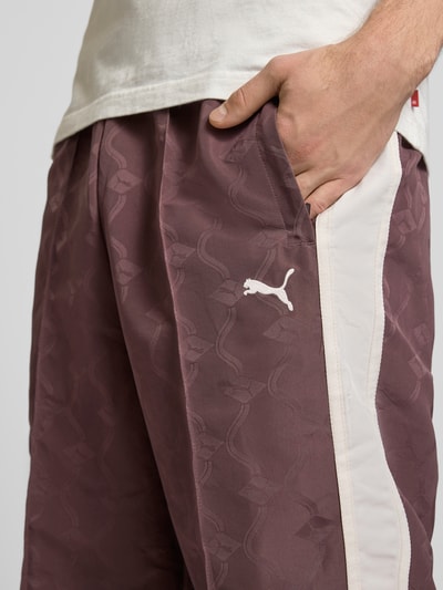 PUMA Performance Spodnie dresowe o prostym kroju z wyhaftowanym logo Czekoladowy 3