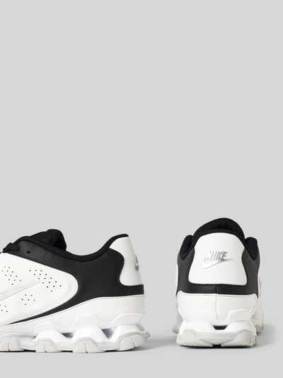 Produktfoto, Sneaker mit Logo-Detail Modell 'REAX 8 NSW SL' von Nike in Schwarz und Weiß, strukturierte Sohle, Herren Sneaker von Nike