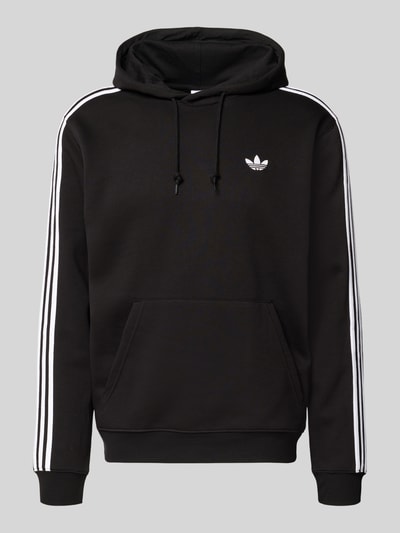 Produktfoto, Hoodie mit Kapuze von adidas Originals in Schwarz, Baumwoll-Mix, weiße Streifen, Label-Stitching, Känguru-Tasche, gerippte Abschlüsse