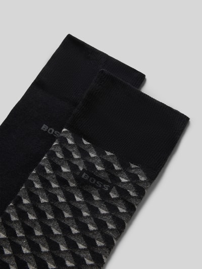 Produktfoto, Socken aus Baumwoll-Mix im 2er-Pack von BOSS, Optik:Unifarben/Optik:Allover-Muster, Label-Schriftzug, Bundabschluss: elastisch, gerippt, Feinstrick, dunkle Farben, fein gemustert, Materialverarbeitung: Baumwoll-Mix, Multipack: 2er-Pack.