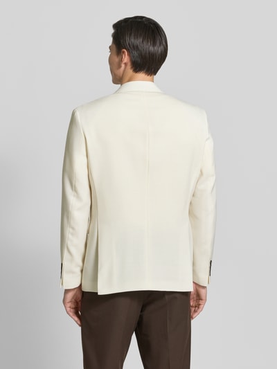 Männermodel trägt Regular Fit Anzugsakko mit Wool-Anteil von SELECTED HOMME, Optik: Unifarben, Material-Mix, Ganzkörperansicht Rückansicht.