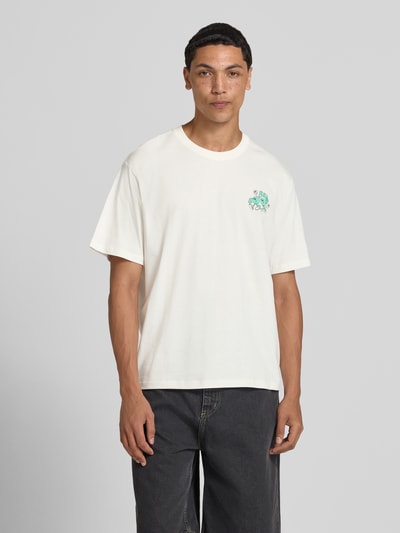 Männermodel trägt T-shirt met motiefprint model 'VINTAGE CARTOON' van Jack & Jones, puur katoen, regular fit, ronde hals, ruglengte maat M 69 cm, Ganzkörperansicht van voren
