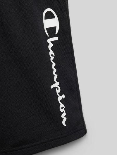 Productfoto, Shorts met Logo en elastische tailleband van CHAMPION in zwart katoenmix, relaxed fit, wit logo, detailopname