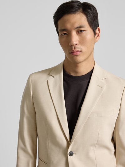 Männermodel trägt Slim Fit Anzugsakko mit Woll-Anteil Modell 'SLIM-NEIL' von SELECTED HOMME, Optik: Unifarben, Nahaufnahme Oberkörper.