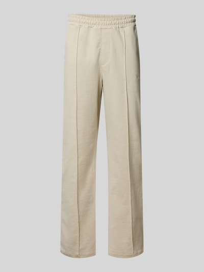 Produktfoto, beige Track Pants mit Logo-Stitching Modell 'Skagen' von Pegador aus reiner Baumwolle, locker geschnitten, strukturierte Oberfläche