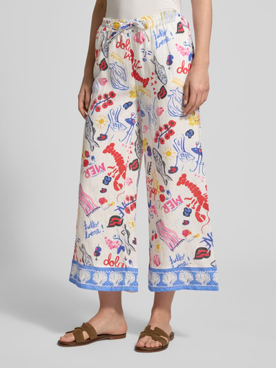 Frauenmodel trägt Wide Fit Leinenhose mit Allover-Motiv-Print von Christian Berg Woman, bunt, künstlerische Muster, elastischer Bund, Ganzkörperansicht von vorne.