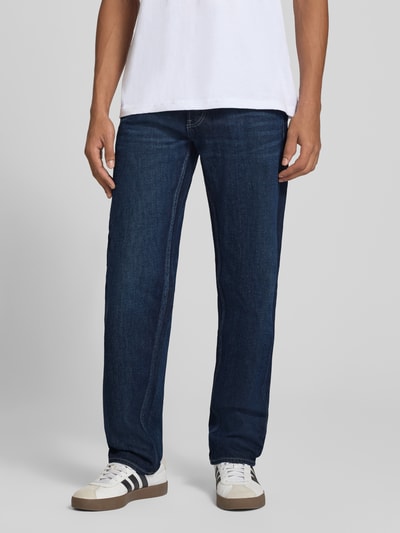 Mannenmodel draagt donkerblauwe slim fit jeans uit katoenmix, Slim Fit Jeans aus Baumwoll-Mix Modell 'Streem' van g-star, heren slim fit jeans van g-star raw, detailopname voorkant.