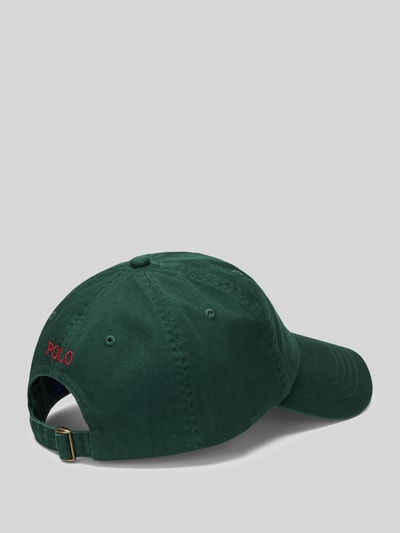 Productfoto, Basecap uit pure katoen van Polo Ralph Lauren in effen donkergroen met logo-detail, geborduurde luchtgaatjes, verstevigde klep, verstelbare band, geweven textuur.