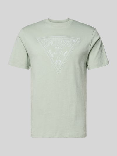 Produktfoto, T-Shirt mit Logo und Rundhalsausschnitt von Guess aus reiner Baumwolle, Regular-Fit, pastellgrün, glatte Textur, Logo-Print auf der Brust, Rückenlänge bei Größe M 70 cm.