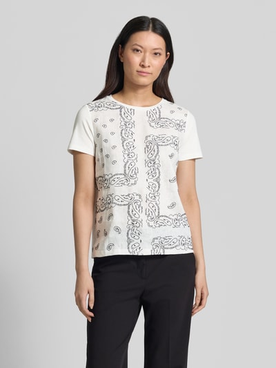 Frauenmodel trägt Regular Fit T-Shirt aus Baumwoll-Leinen-Mix Modell 'GENIO' von Weekend Max Mara mit Optik:Allover-Muster, Unifarben, Rundhals, Kurzarm, Materialverarbeitung: Jersey, Material: Baumwoll-Mix, reines Leinen, Ganzkörperansicht von vorne.