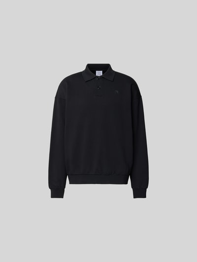 Produktfoto, Regular Fit Poloshirt aus Baumwoll-Mix von VETEMENTS in Schwarz, Sweat-Optik mit Polokragen und Relaxed Fit, Rückenlänge 71 cm bei Größe M