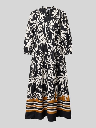 Produktfoto, Midikleid mit Eingrifftaschen und 3/4-Arm von Emily Van den Bergh, Reine Baumwolle, A-Linie, Allover-Look, V-Ausschnitt, Knopfleiste, florales Muster in Schwarz und Weiß, gestreifter Saum mit braunen und beigen Akzenten, strukturierte Baumwolltextur, Rückenlänge 126 cm, Brustweite 43 cm, Ärmellänge 46 cm, Größe 36.