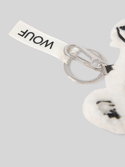 Productfoto, Sleutelhanger met logo-detail model 'Luna Cat' van WOUF, wit katoen met karabijnhaak en zwarte accenten.