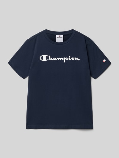 Produktfoto, T-Shirt aus reiner Baumwolle von Champion für Kinder in Dunkelblau mit weißem Label-Print, gerade Passform, Rundhalsausschnitt.